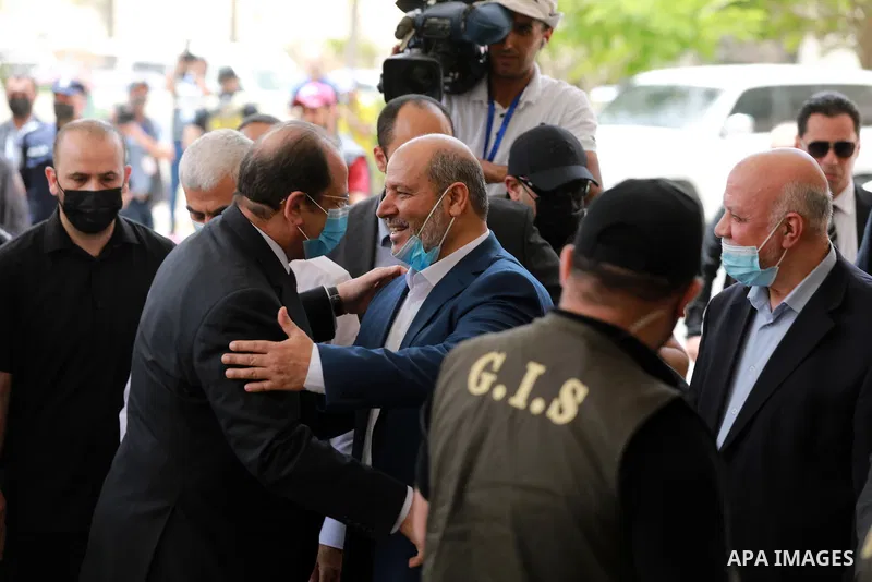 Hamas official Khalil al-Haya, welcomes the General Abbas Kamel, Egypt's intelligence chief, as the arrives for a meeting with leaders of Hamas in Gaza City on May 31, 2021. Photo by Majdi Fathi