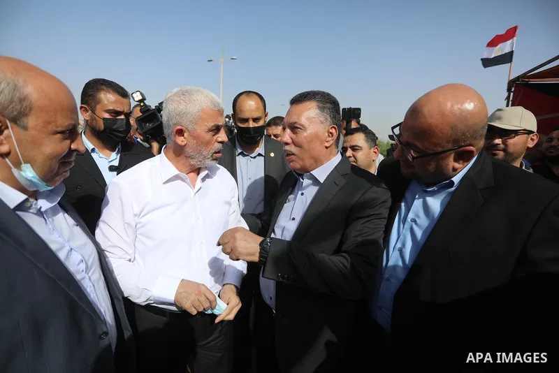Yahya Sinwar Hamas' political chief in Gaza leaves with Abbas Kamel Egypt's intelligence chief after their meeting in Gaza city on May 31, 2021. Photo by Ashraf Amra