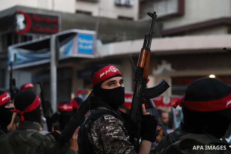 Supporters of Popular Front for the Liberation of Palestine (PFLP) attend an anti-Israel rally in Gaza city on June 2, 2021. The Egyptian-brokered truce ended 11 days of heavy Israeli bombing of Gaza and rocket fire from...