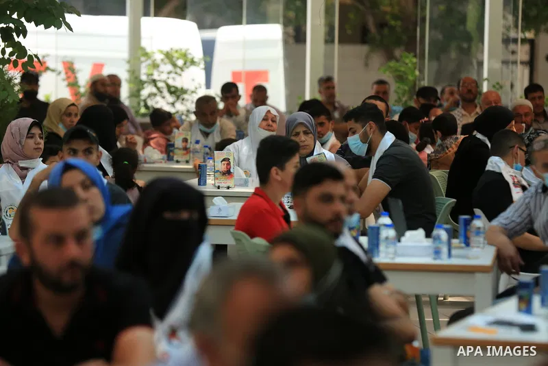 Palestinians attend a ceremony to honor the families of martyrs in Gaza city on June 3, 2021. The Egyptian-brokered truce ended 11 days of heavy Israeli bombing of Gaza and rocket fire from the impoverished coastal encla...