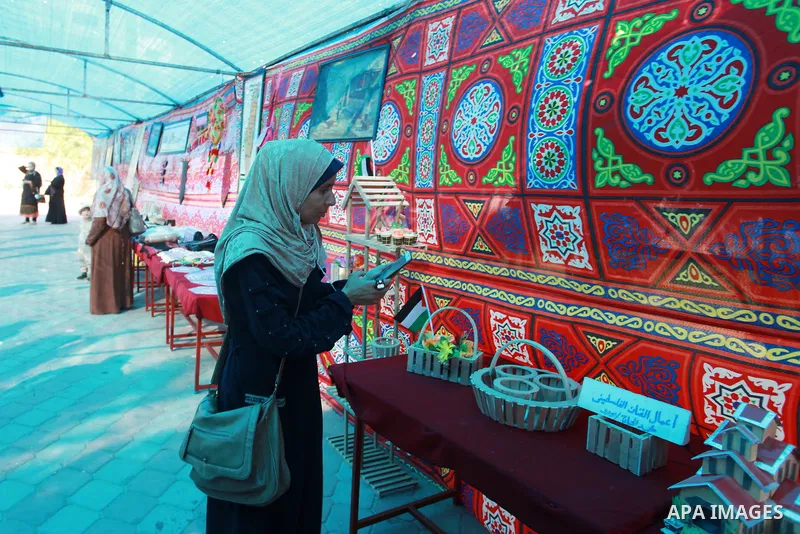 Palestinians take part in a heritage Festival on the occasion of World Refugee Day, at Nuseirat refugee camp, in the center of Gaza Strip on June 20, 2021. Palestine refugees are defined as “persons whose normal place of...