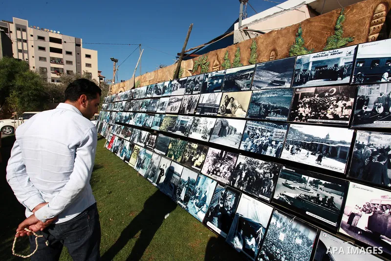 Palestinians take part in a heritage Festival on the occasion of World Refugee Day, at Nuseirat refugee camp, in the center of Gaza Strip on June 20, 2021. Palestine refugees are defined as “persons whose normal place of...