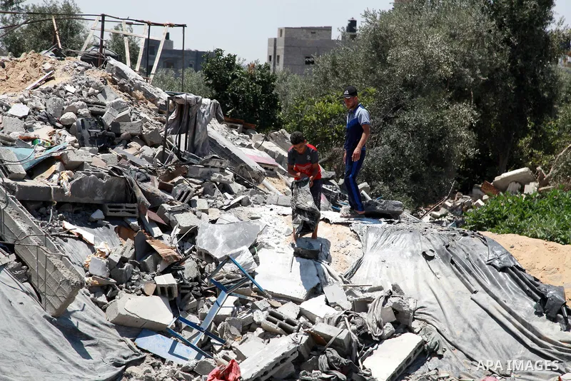 Palestinian man Iyad al-Attar, 46, inspects the fish's farm in Beit Lahia in the northern of Gaza Strip on June 22, 2021. Fish farms in Gaza strip were subjected to material loss, cause of The latest Israeli military esc...
