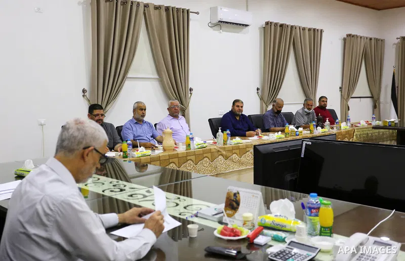 Palestinian faction leaders take part in a meeting in Gaza city on June 21, 2021. The meeting comes as Hamas leaders and the Palestinian factions in Gaza are making contacts with international and Arab parties with the a...