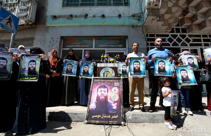 Palestinian supporters of Islamic Jihad movement take part in a protest to show solidarity with prisoners on hunger strike, in Israeli Jails in Gaza city, on June 23, 2021. Three Palestinian prisoners in Israeli detentio...