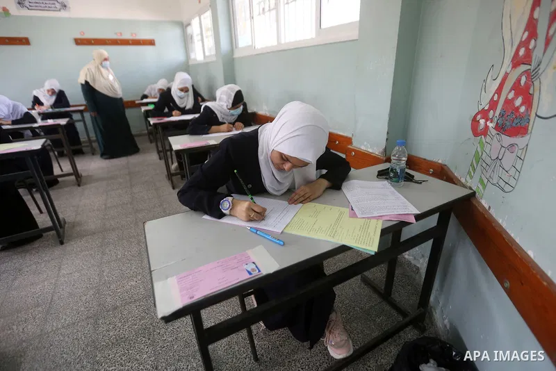 Palestinian students sit for their final high school exams, known as "Tawjihi" in Gaza city on June 24, 2021, amid concerns about the spread of the novel coronavirus pandemic. More than 84598 students in the West Bank an...