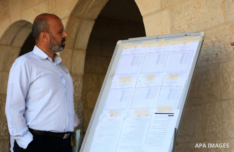 Palestinian students wait for the start of final high school exams at a school in the West Bank city of Jenin on June 24, 2021, amid concerns about the spread of the novel coronavirus pandemic. More than 84598 students i...