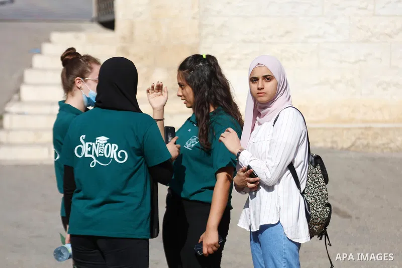 Palestinian students wait for the start of final high school exams at a school in the West Bank city of Jenin on June 24, 2021, amid concerns about the spread of the novel coronavirus pandemic. More than 84598 students i...