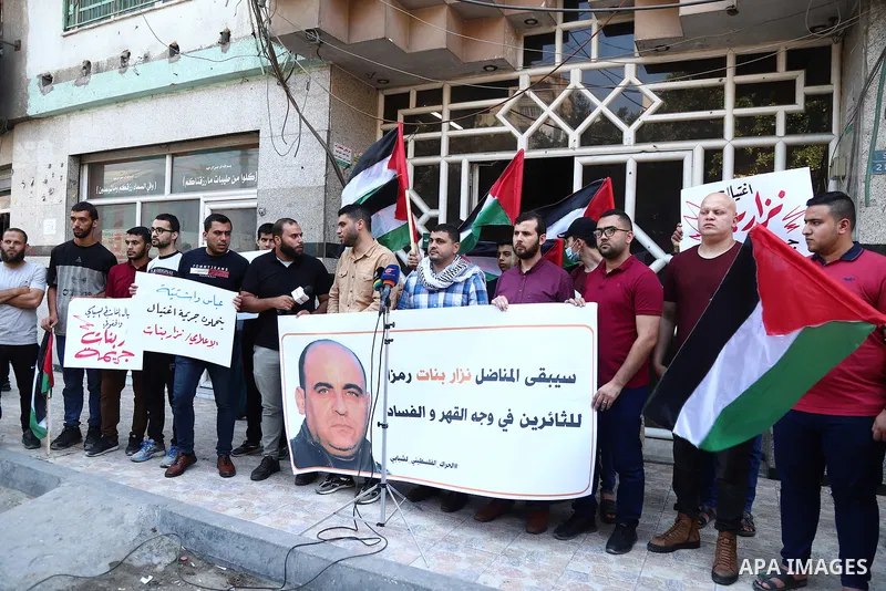 Demonstrators take part in a protest following the death of Nizar Banat, a Palestinian parliamentary candidate who criticised the Palestinian Authority and died after being arrested by PA security forces, in Gaza city Ju...