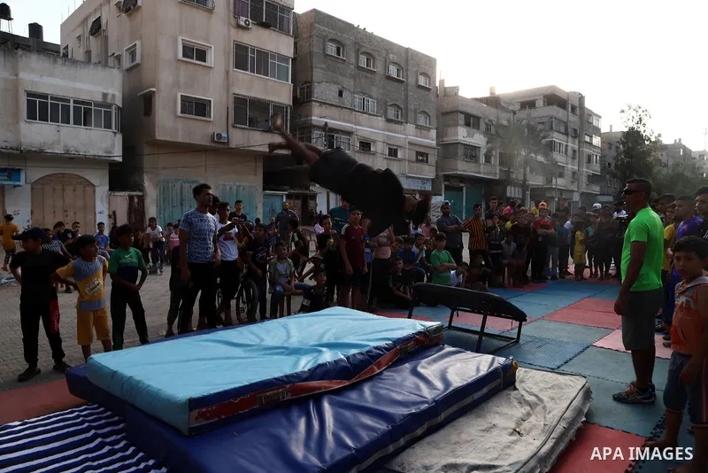 Palestinian youths show off their skills in parkour, gymnastics and breakdance, in Gaza city on June 25, 2021. Breakdance, the hip hop dance style that began on the streets of New York City more than 30 years ago has bec...