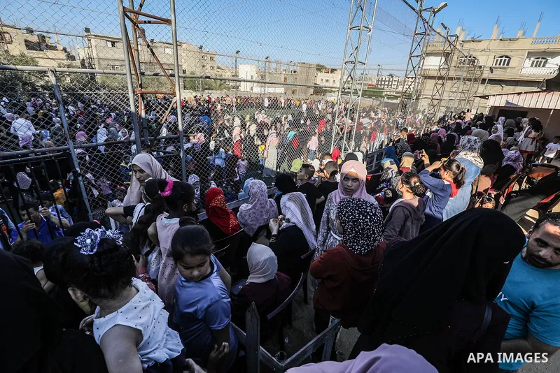 Palestinian children participate in a mental health support session during entertainment festival after the latest Israeli escalation, in Rafah in the southern Gaza Strip, on June 25, 2021. Photo by Abed Deeb