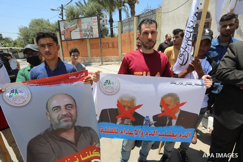Palestinian supporters of Al-Ahrar movement take part in a protest following the death of Nizar Banat, a Palestinian parliamentary candidate who criticised the Palestinian Authority and died after being arrested by PA se...