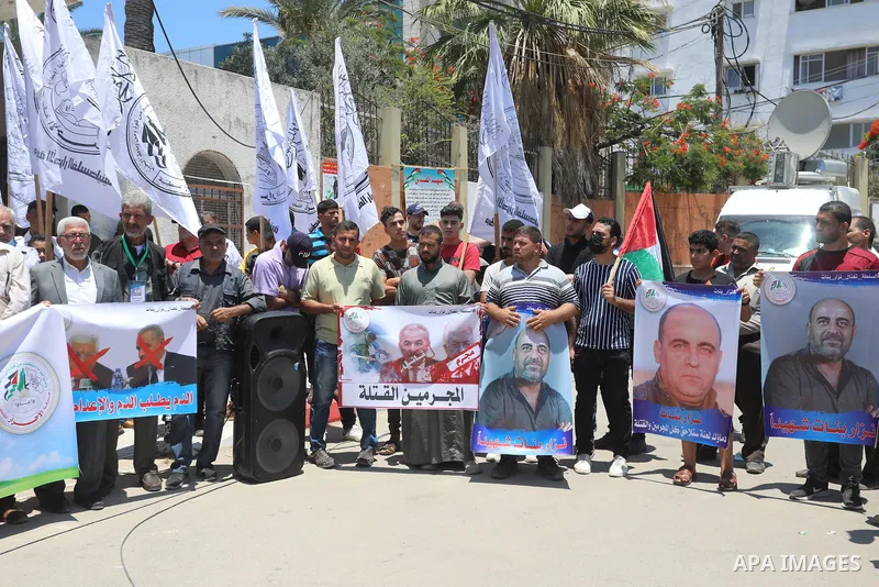 Palestinian supporters of Al-Ahrar movement take part in a protest following the death of Nizar Banat, a Palestinian parliamentary candidate who criticised the Palestinian Authority and died after being arrested by PA se...