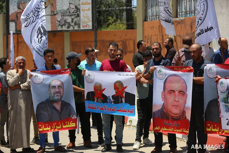 Palestinian supporters of Al-Ahrar movement take part in a protest following the death of Nizar Banat, a Palestinian parliamentary candidate who criticised the Palestinian Authority and died after being arrested by PA se...