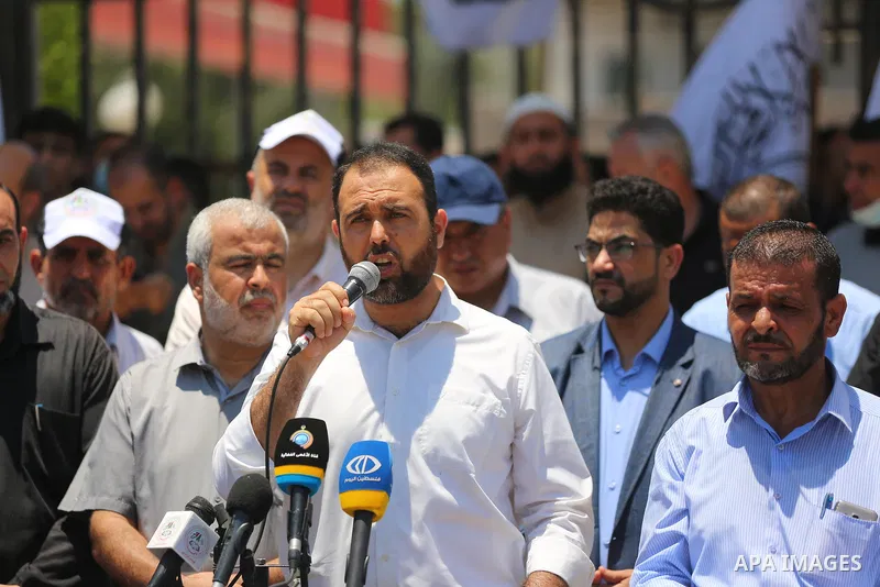 Palestinian supporters of Al-Ahrar movement take part in a protest following the death of Nizar Banat, a Palestinian parliamentary candidate who criticised the Palestinian Authority and died after being arrested by PA se...