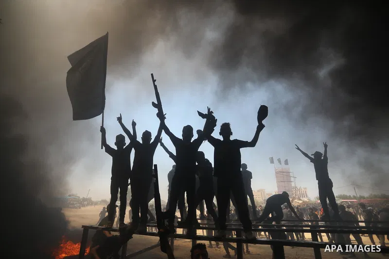 Young Palestinians attend a military summer camp organised by the Islamic Jihad Movement, in Gaza City, June 26, 2021. Photo by Ashraf Amra