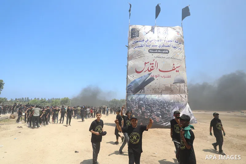 Young Palestinians attend a military summer camp organised by the Islamic Jihad Movement, in Gaza City, June 26, 2021. Photo by Ashraf Amra