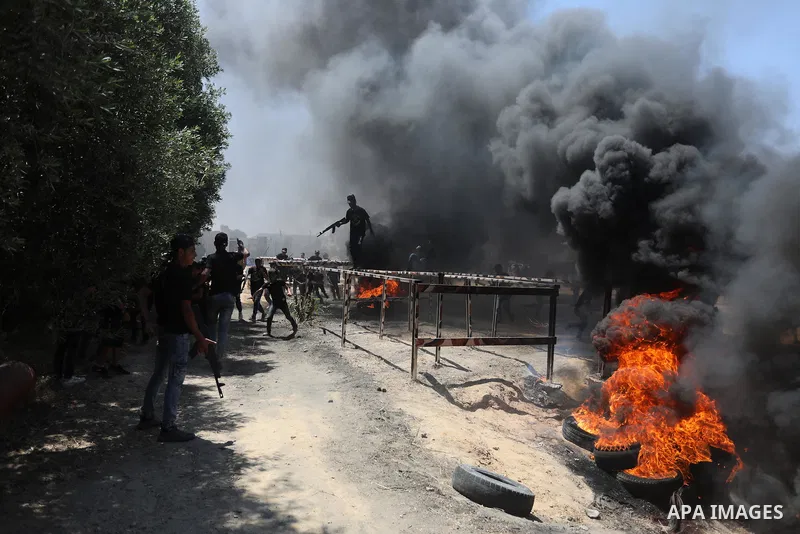 Young Palestinians attend a military summer camp organised by the Islamic Jihad Movement, in Gaza City, June 26, 2021. Photo by Ashraf Amra