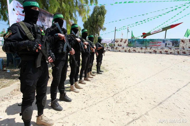 Young Palestinians take part in a military-style exercise a Hamas-run summer camp at the Yarmouk military site, in Gaza city, on July 26, 2021. Photo by Naaman Omar