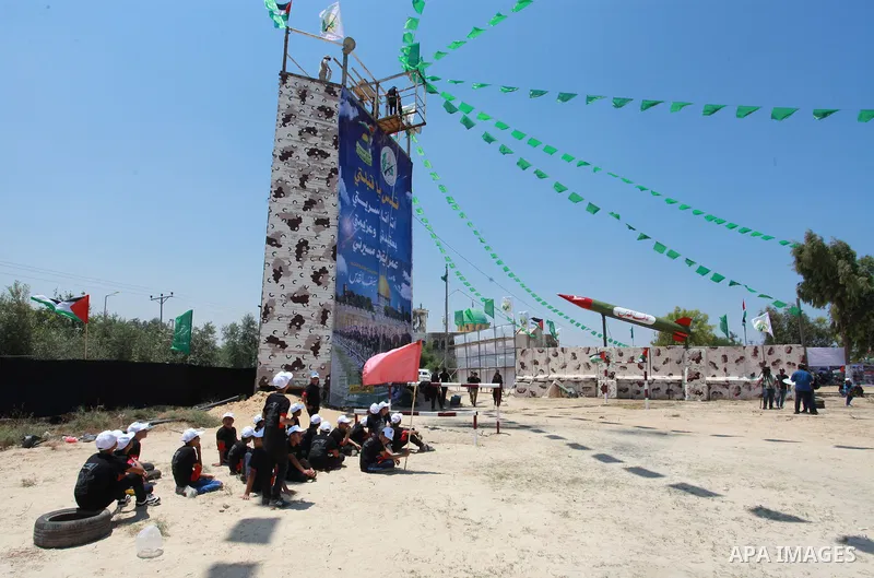 Young Palestinians take part in a military-style exercise a Hamas-run summer camp at the Yarmouk military site, in Gaza city, on July 26, 2021. Photo by Naaman Omar
