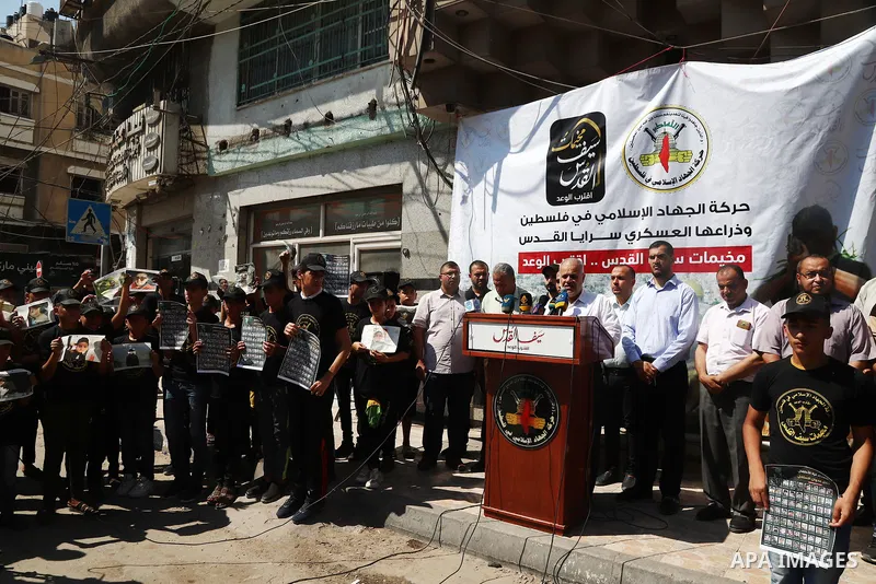 Palestinian youths attend a press conference to announc the summer camps organised by the Islamic Jihad Movement, in Gaza city, on July 26, 2021. Photo by Naaman Omar