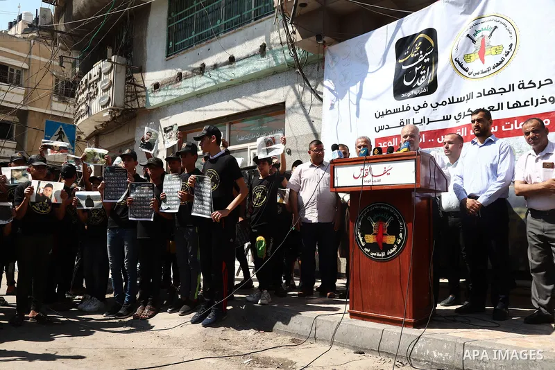 Palestinian youths attend a press conference to announc the summer camps organised by the Islamic Jihad Movement, in Gaza city, on July 26, 2021. Photo by Naaman Omar