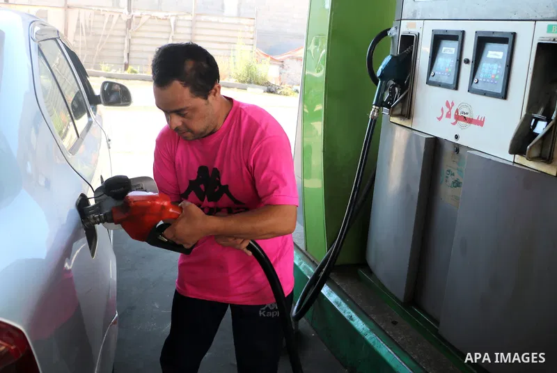 Palestinian, Mohammed Mansour, 30, with Down's Syndrome, works at a gas station, in Rafah in the southern of Gaza strip, on June 26, 2021. Mansour has been working in the station to support his family. Down syndrome or D...