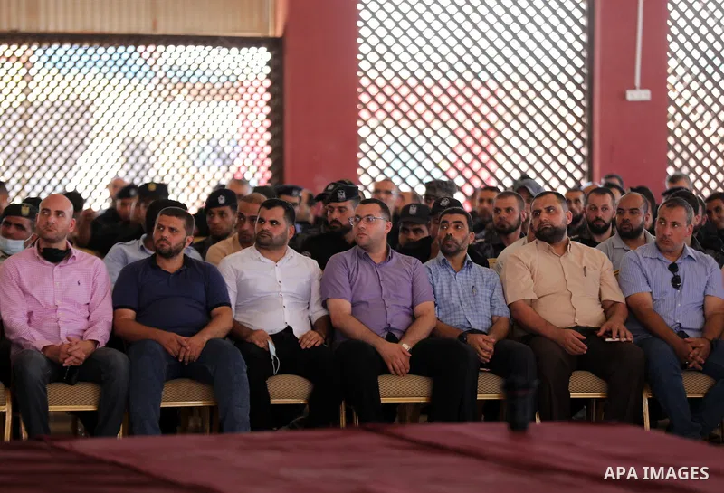 Palestinian police officers attends graduation ceremony organized by the General Directorate of Training in the Palestinian Police, in Gaza city on June 27, 2021. Photo by Mahmoud Nasser