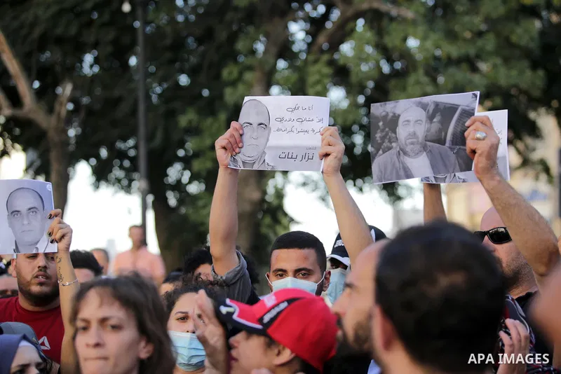 Palestinians take part during a protest aganist the death of human rights activist Nizar Banat in the West Bank city of Ramallah, on June 27, 2021. Photo by Ibrahim atta