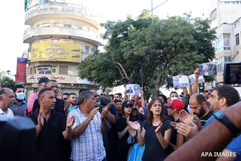 Palestinians take part during a protest aganist the death of human rights activist Nizar Banat in the West Bank city of Ramallah, on June 27, 2021. Photo by Ibrahim atta