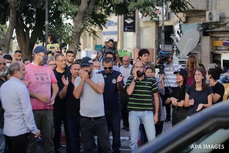 Palestinians take part during a protest aganist the death of human rights activist Nizar Banat in the West Bank city of Ramallah, on June 27, 2021. Photo by Ibrahim atta