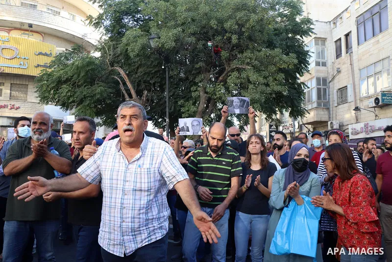 Palestinians take part during a protest aganist the death of human rights activist Nizar Banat in the West Bank city of Ramallah, on June 27, 2021. Photo by Ibrahim atta