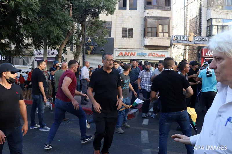 Palestinians take part during a protest aganist the death of human rights activist Nizar Banat in the West Bank city of Ramallah, on June 27, 2021. Photo by Ibrahim atta