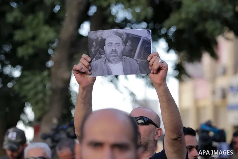 Palestinians take part during a protest aganist the death of human rights activist Nizar Banat in the West Bank city of Ramallah, on June 27, 2021. Photo by Ibrahim atta