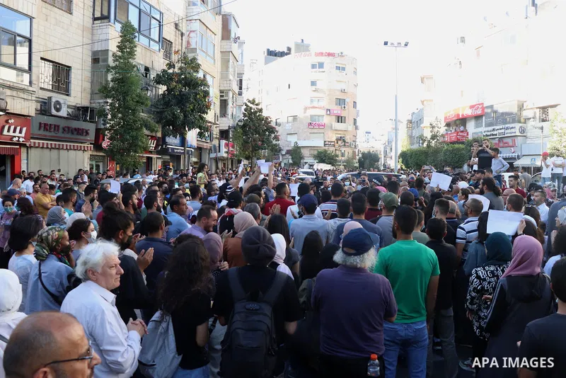 Palestinians take part during a protest aganist the death of human rights activist Nizar Banat in the West Bank city of Ramallah, on June 27, 2021. Photo by Ibrahim atta
