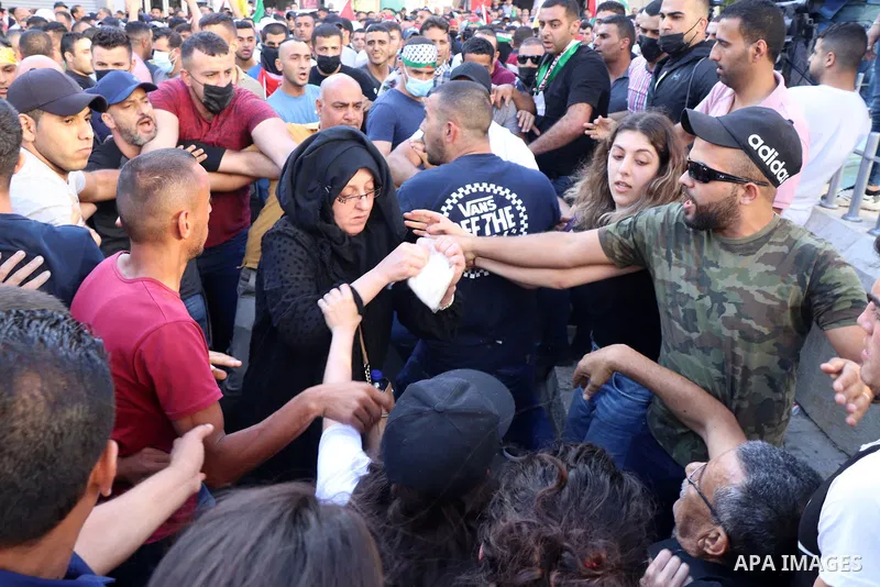 Palestinians take part during a protest aganist the death of human rights activist Nizar Banat in the West Bank city of Ramallah, on June 27, 2021. Photo by Ibrahim atta