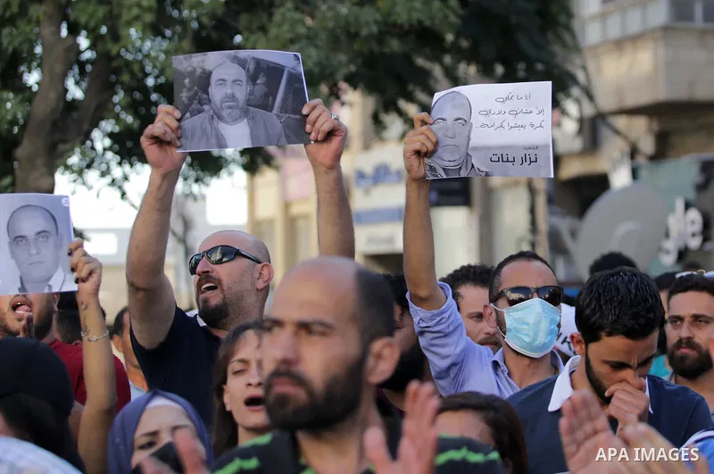 Palestinians take part during a protest aganist the death of human rights activist Nizar Banat in the West Bank city of Ramallah, on June 27, 2021. Photo by Ibrahim atta