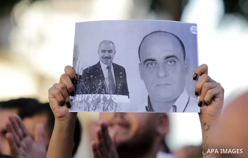 Palestinians take part during a protest aganist the death of human rights activist Nizar Banat in the West Bank city of Ramallah, on June 27, 2021. Photo by Ibrahim atta