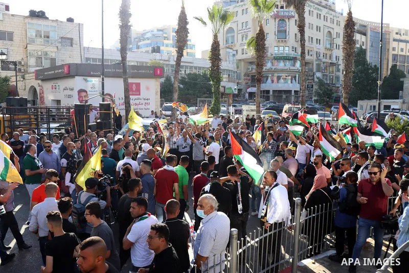 Protesters take part in a protest in solidarity with Palestinian prisoner on hunger strike in Israeli jails, Ghadanfar Abu Utwan, in the West Bank city of Ramallah, on June 27, 2021. Abu Utwan has been on hunger strike f...