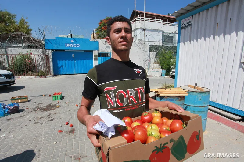 Palestinian farmers and traders take part in a protest against Israeli authorities a new restriction on them in front of the headquarter United Nation "UNSCO", in Gaza city, on June 28, 2021. Israeli authorities have pla...