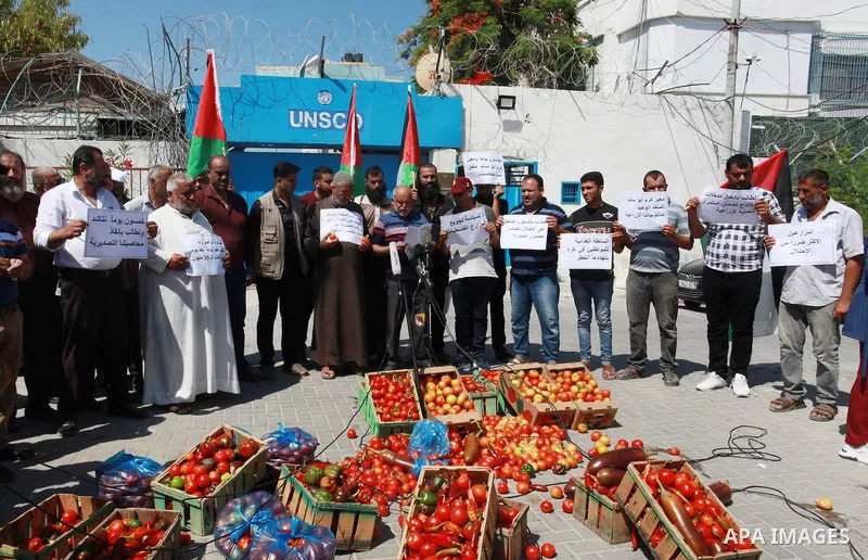 Palestinian farmers and traders take part in a protest against Israeli authorities a new restriction on them in front of the headquarter United Nation "UNSCO", in Gaza city, on June 28, 2021. Israeli authorities have pla...