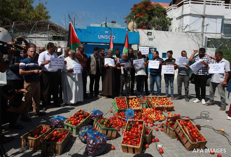 Palestinian farmers and traders take part in a protest against Israeli authorities a new restriction on them in front of the headquarter United Nation "UNSCO", in Gaza city, on June 28, 2021. Israeli authorities have pla...