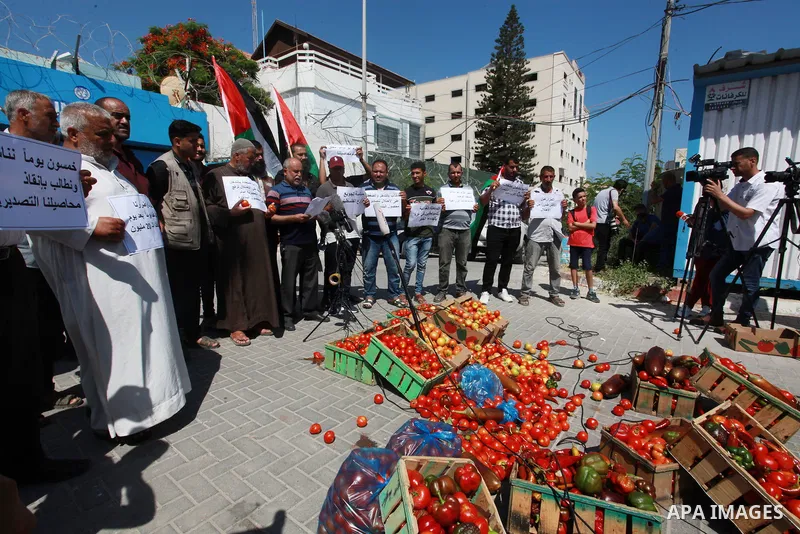 Palestinian farmers and traders take part in a protest against Israeli authorities a new restriction on them in front of the headquarter United Nation "UNSCO", in Gaza city, on June 28, 2021. Israeli authorities have pla...