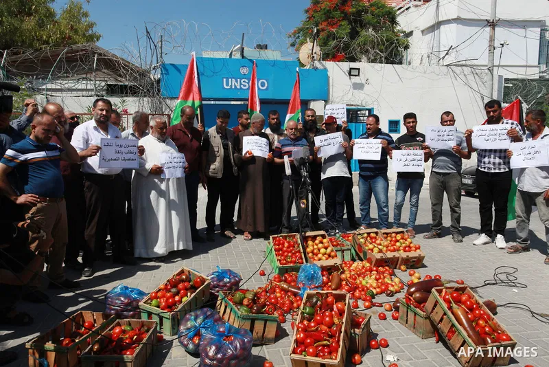 Palestinian farmers and traders take part in a protest against Israeli authorities a new restriction on them in front of the headquarter United Nation "UNSCO", in Gaza city, on June 28, 2021. Israeli authorities have pla...