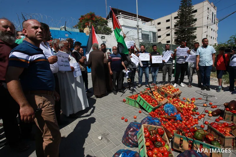 Palestinian farmers and traders take part in a protest against Israeli authorities a new restriction on them in front of the headquarter United Nation "UNSCO", in Gaza city, on June 28, 2021. Israeli authorities have pla...