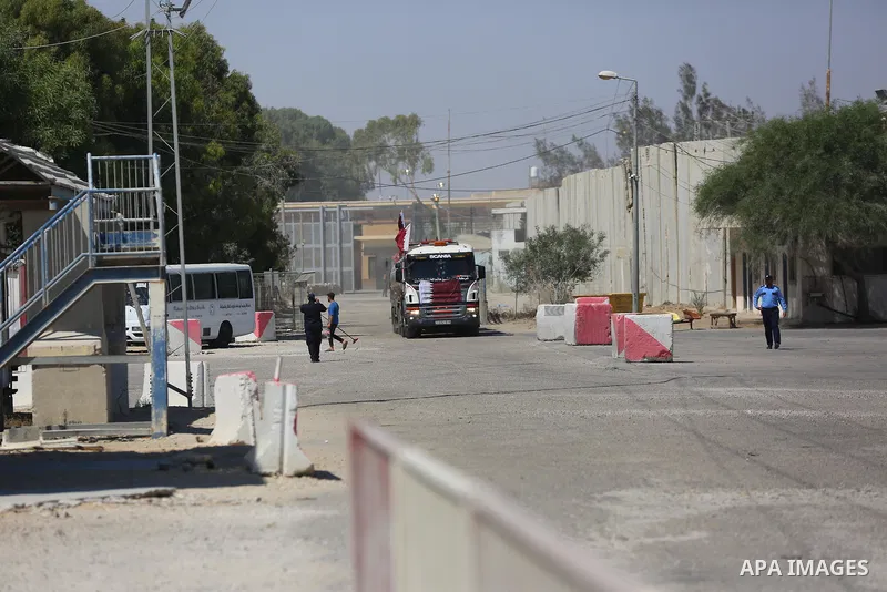 A fuel tanker for Gaza's sole power plant arrives while flying Qatari flags in Rafah in the southern Gaza Strip, on June 28, 2021 Israel allowed fuel tankers funded by Qatar to enter the Gaza Strip via the Kerem Shalom c...