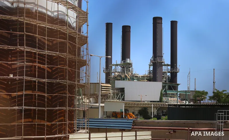 A fuel tanker arrives at the Gaza power plant, in the central Gaza Strip June 28, 2021. Israel allowed fuel tankers funded by Qatar to enter the Gaza Strip via the Kerem Shalom crossing, Monday, June 28. This is the firs...