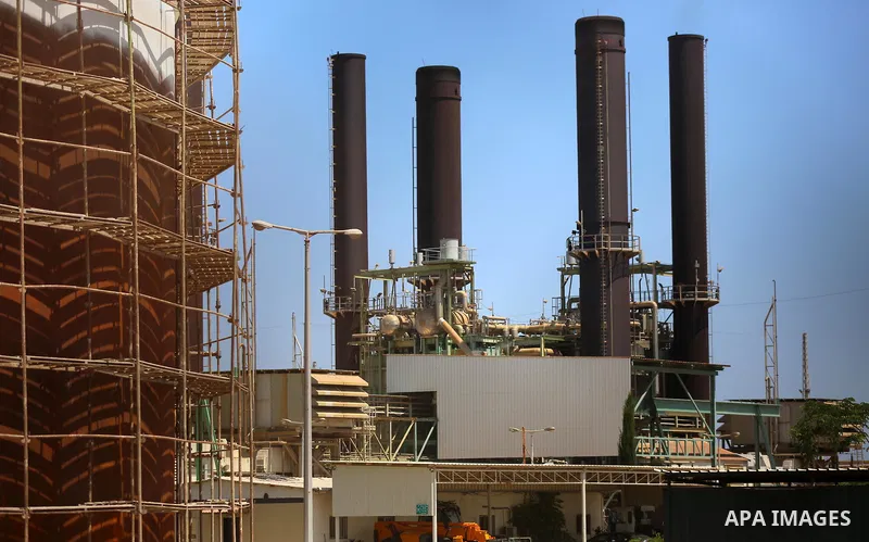 A fuel tanker arrives at the Gaza power plant, in the central Gaza Strip June 28, 2021. Israel allowed fuel tankers funded by Qatar to enter the Gaza Strip via the Kerem Shalom crossing, Monday, June 28. This is the firs...