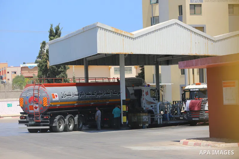 A fuel tanker arrives at the Gaza power plant, in the central Gaza Strip June 28, 2021. Israel allowed fuel tankers funded by Qatar to enter the Gaza Strip via the Kerem Shalom crossing, Monday, June 28. This is the firs...