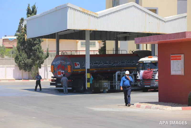A fuel tanker arrives at the Gaza power plant, in the central Gaza Strip June 28, 2021. Israel allowed fuel tankers funded by Qatar to enter the Gaza Strip via the Kerem Shalom crossing, Monday, June 28. This is the firs...